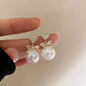 Fashion Unique Glossy Shell Flower Pendant Earrings for Women Temperament Pearl Earrings Sweet Design Wedding Gifts